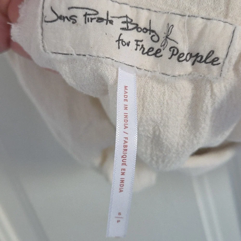 Jen's Pirate Booty For Free People Cream Wrap Top